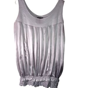 Silver sleeveless blouse ruffled bottom